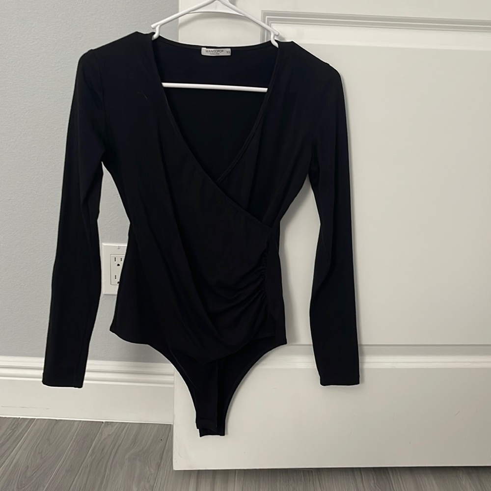Woman’s long sleeve body suit